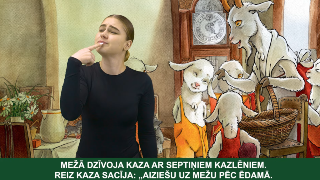 Jauna sieviete melnā apģērbā stāv priekšplānā un ar pirkstu pie lūpām attēlo runājošu žestu. Aiz viņas redzama ilustrēta aina no pasakas par kazu un septiņiem kazlēniem: kaza ar grozu un vairāki kazlēni mājas interjerā pie sienas pulksteņa. Attēla apakšā ir teksts latviešu valodā: “Mežā dzīvoja kaza ar septiņiem kazlēniem. Reiz kaza sacīja: ‘Aiziešu uz mežu pēc ēdamā.’”